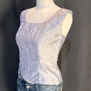Silver sleeveless top with button up back